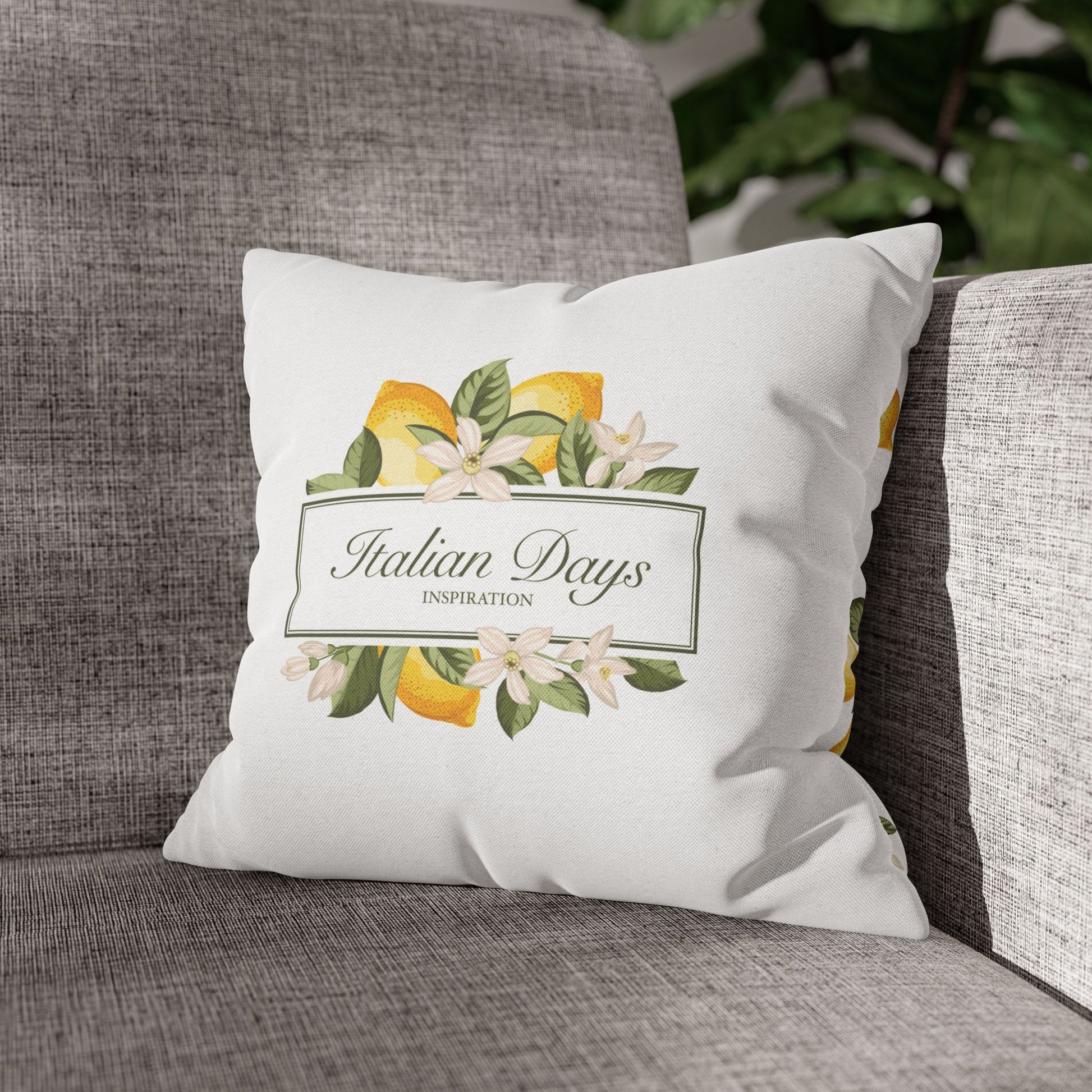 Italian Days lemon botanical pillow cover styled on a gray sofa