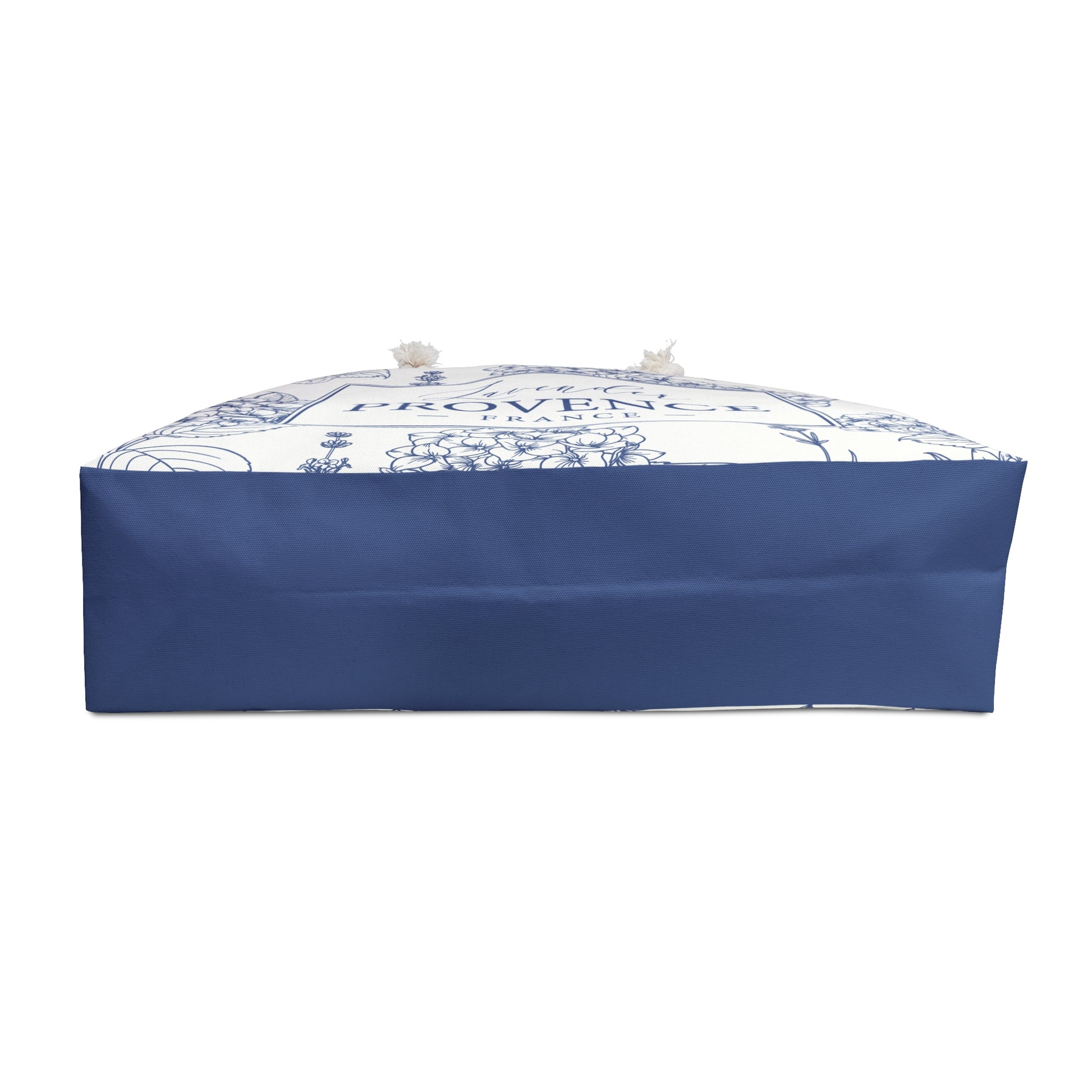 Side profile view of the lavender weekender bag showing navy blue base panel and patterned upper section with branding