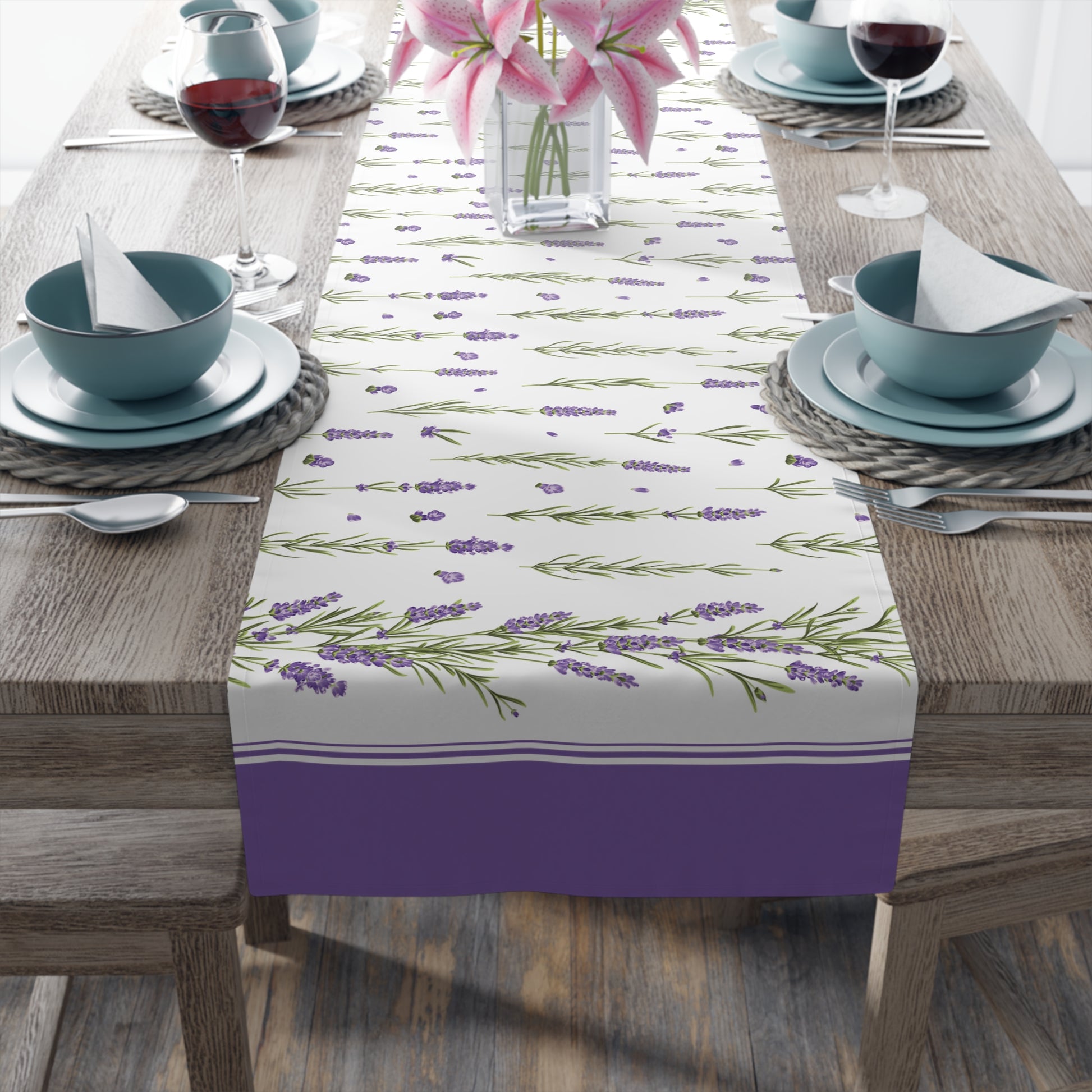 Lavender sprig table runner styled on a dining table, alternate angle with wine glasses and lilies