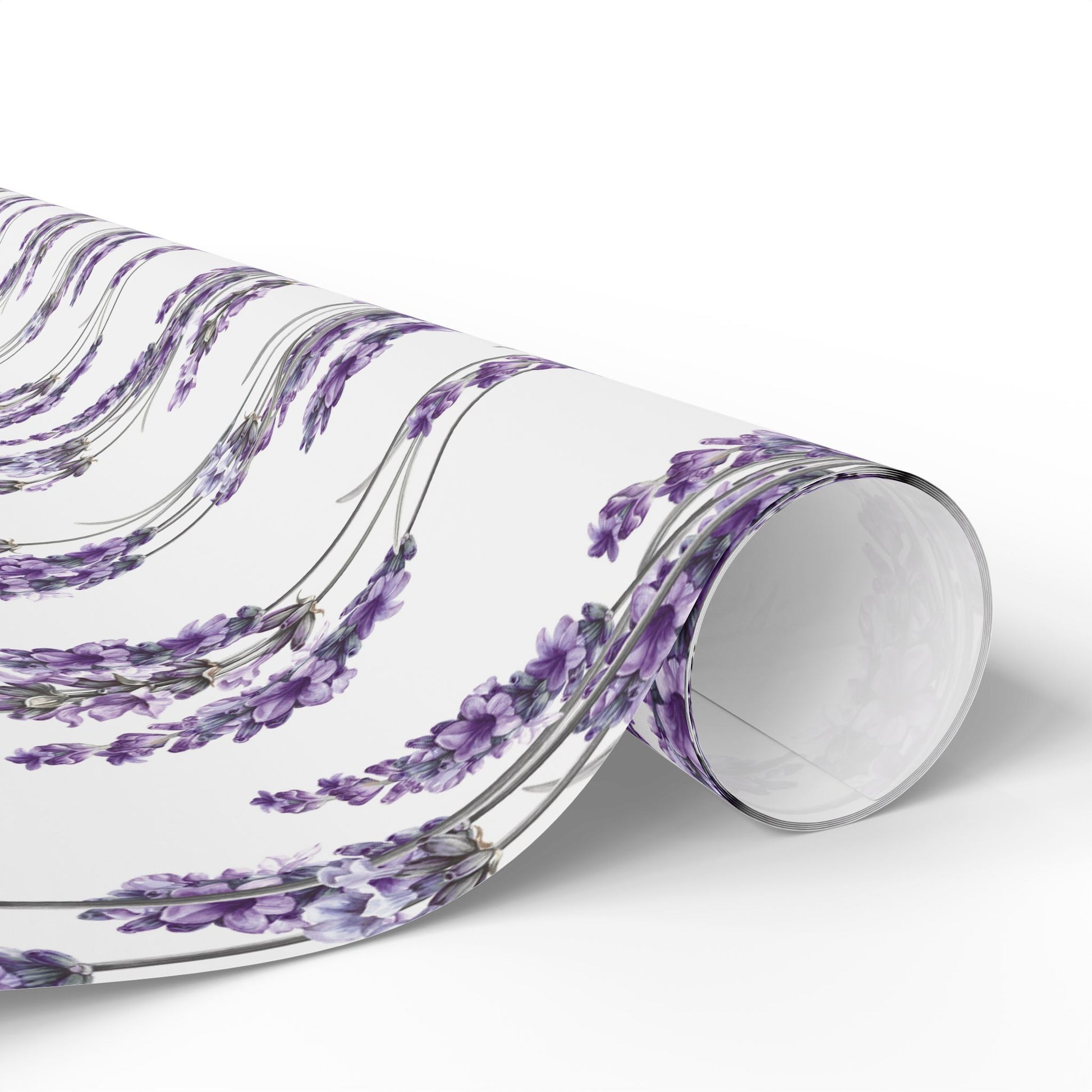 Rolled sheet of lavender sprig floral wrapping paper unrolling to show the pattern
