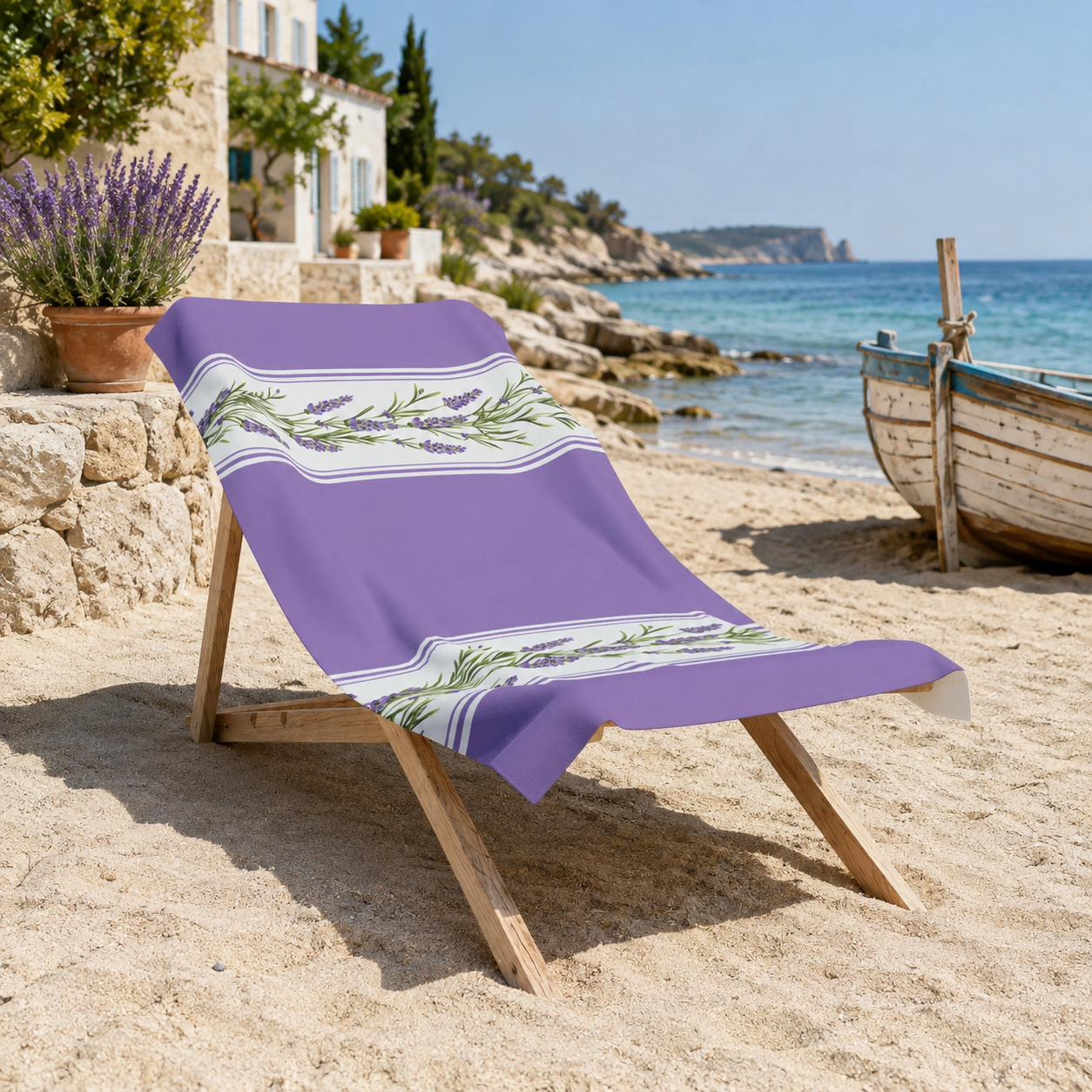 Lavender stripe beach towel draped over a wooden beach chair on sandy Mediterranean shoreline, with rocky cliffs, potted lavender, stone cottage, fishing boat, and azure sea in the background