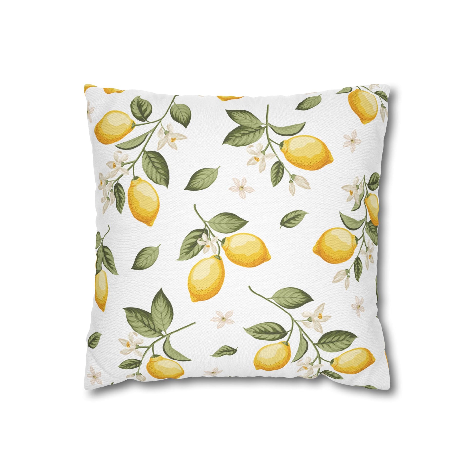 Square throw pillow featuring a bright botanical print of lemon branches with yellow fruits, green leaves, and white flowers on white background