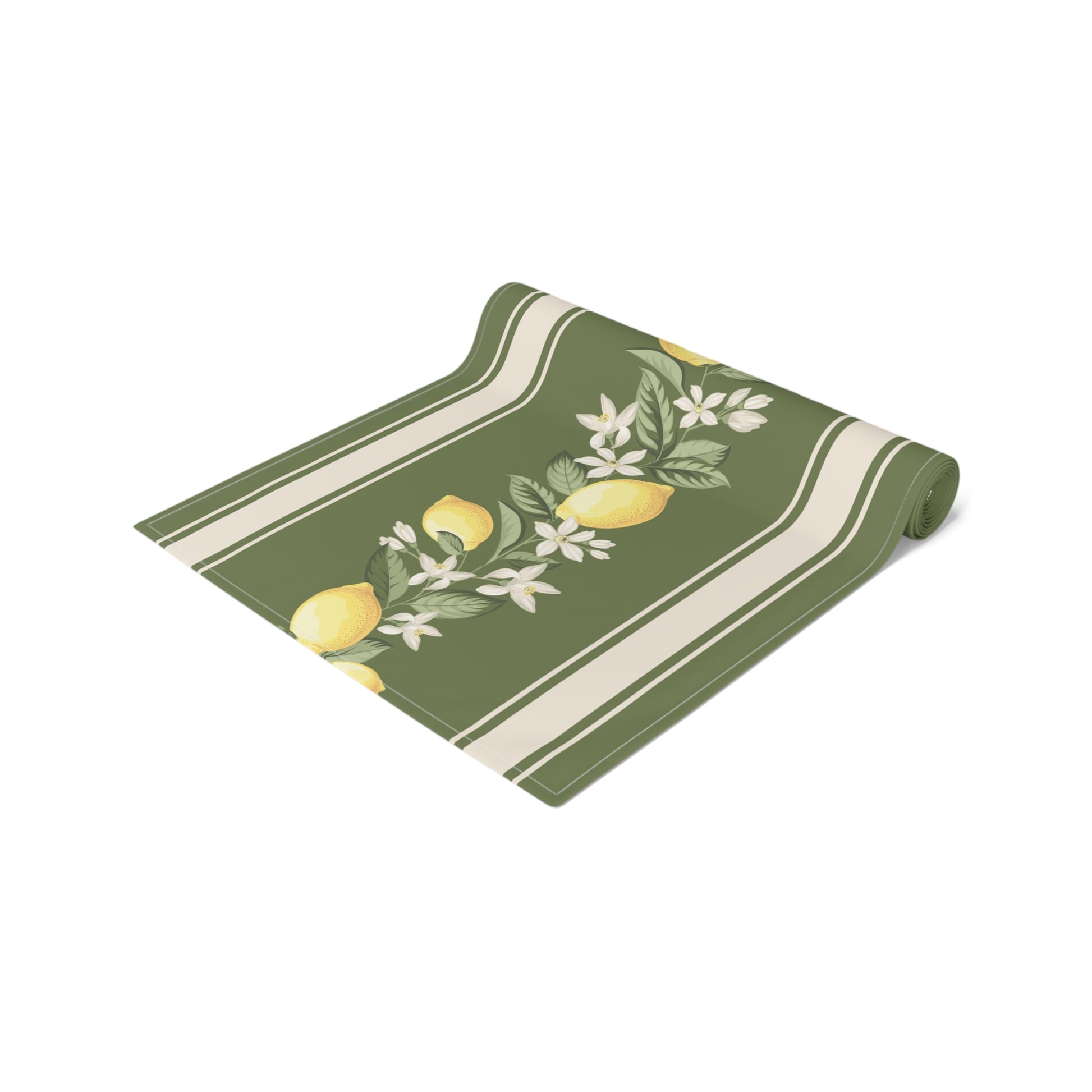 Angled view of rolled lemon grove table runner with lemon blossom sprig
