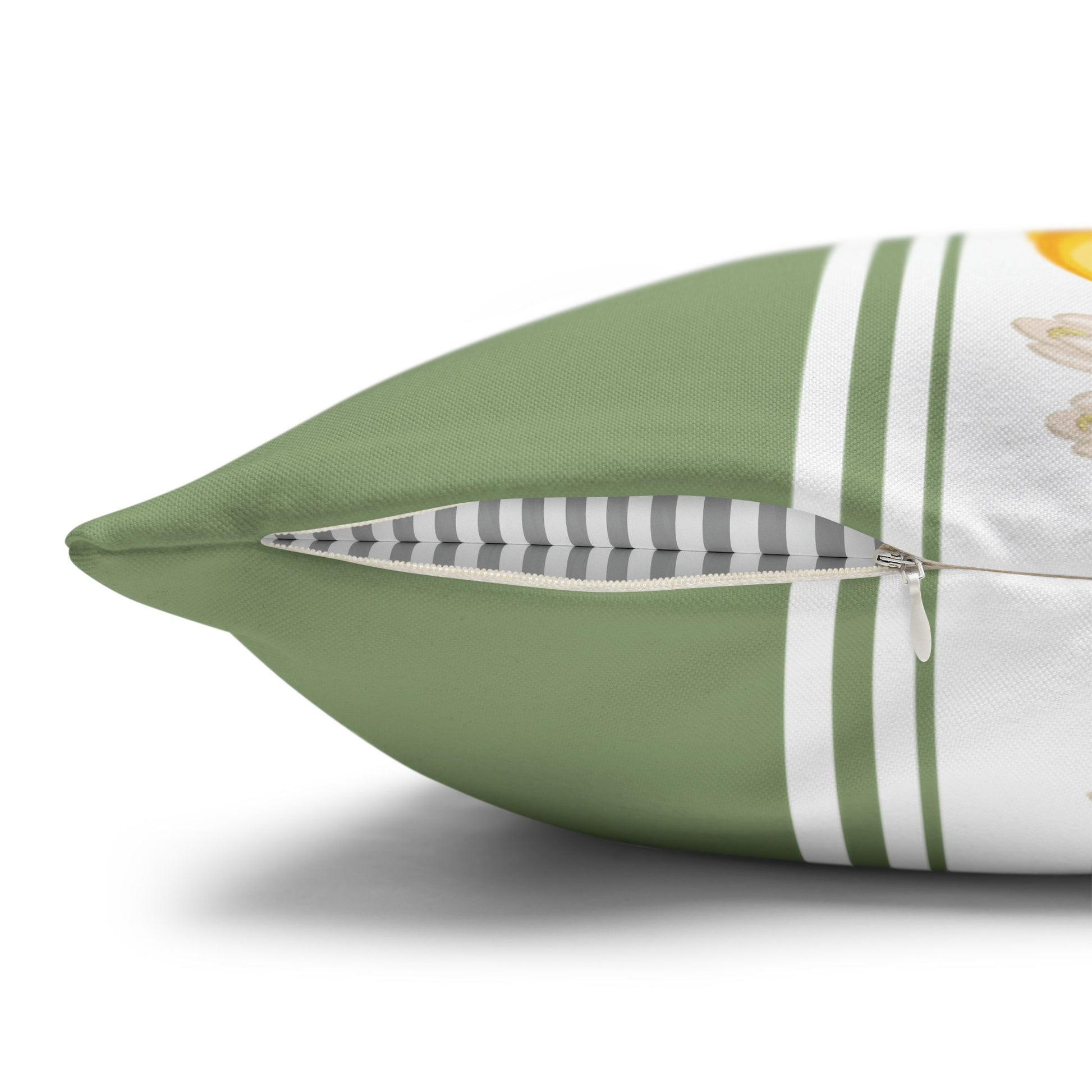 Close-up of the concealed zipper and striped reverse on a lemon stripe pillow cover