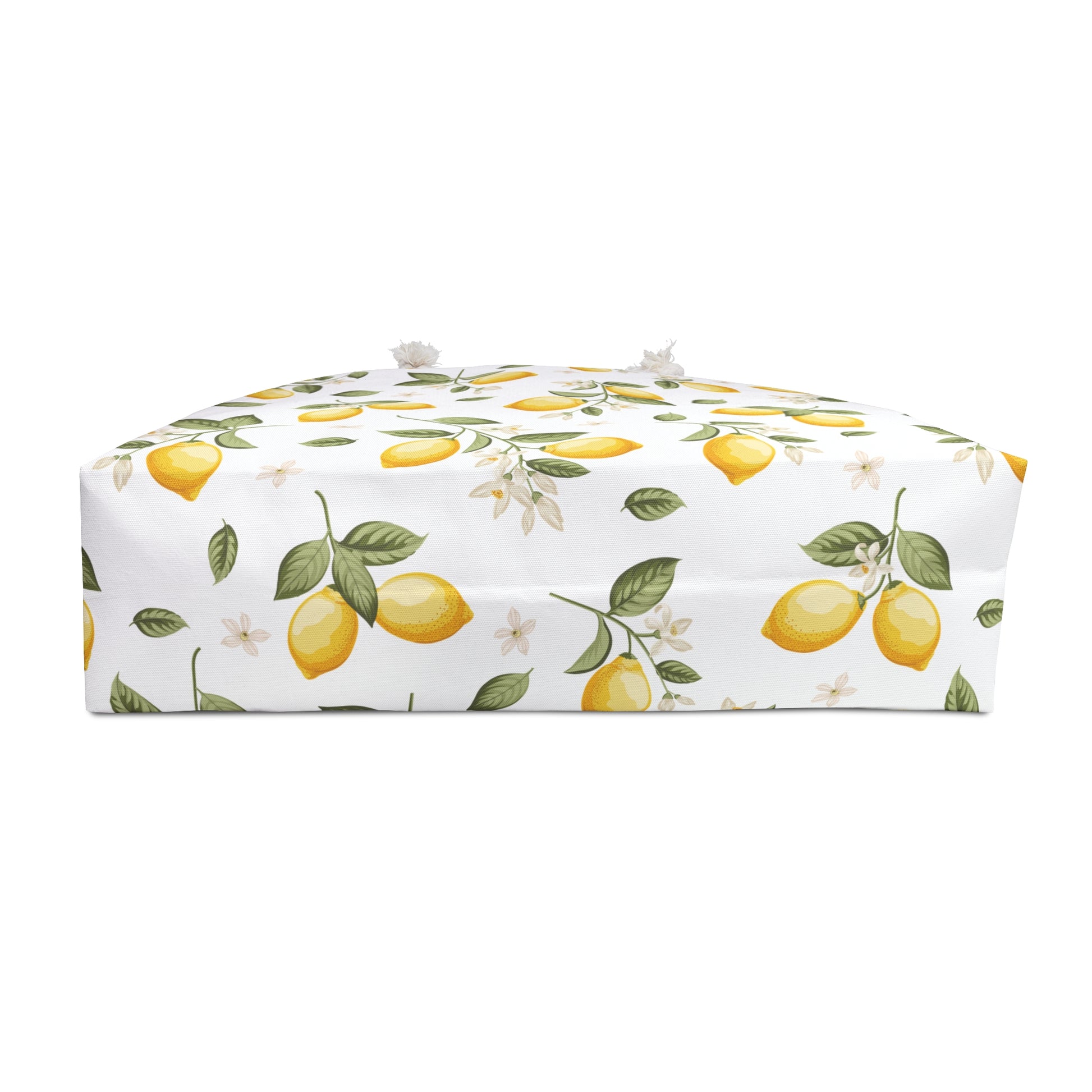 Bottom view of the lemon print weekender bag showing the full base panel with citrus botanical pattern