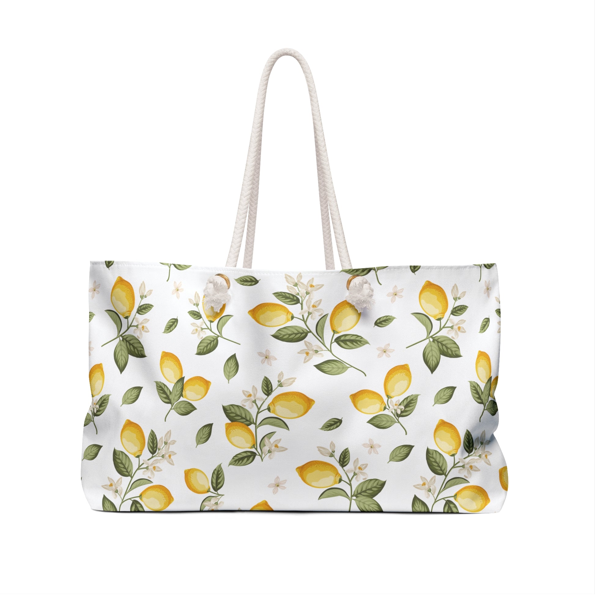 Close-up front view of the lemon print weekender bag showing yellow citrus fruits, green leaves, and rope handles
