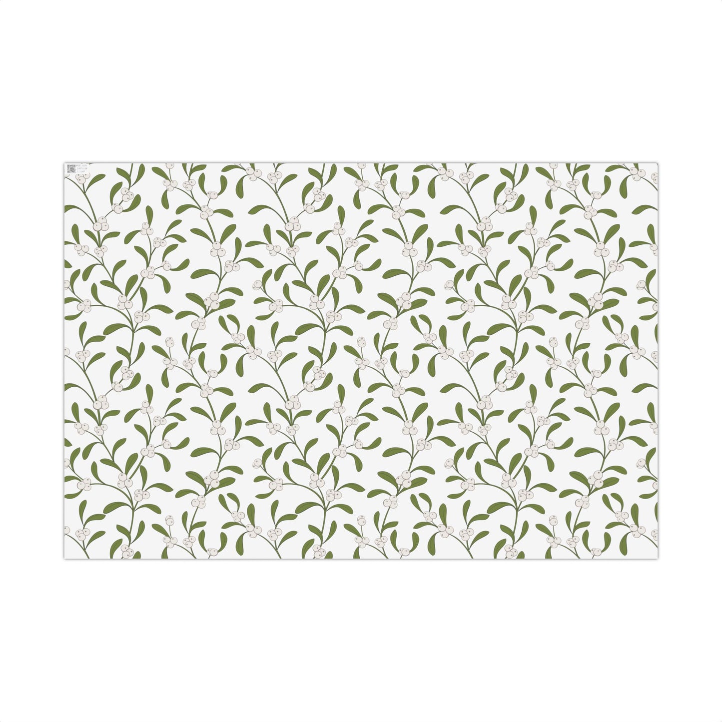 Mistletoe pattern gift wrap paper, horizontal flat-lay view