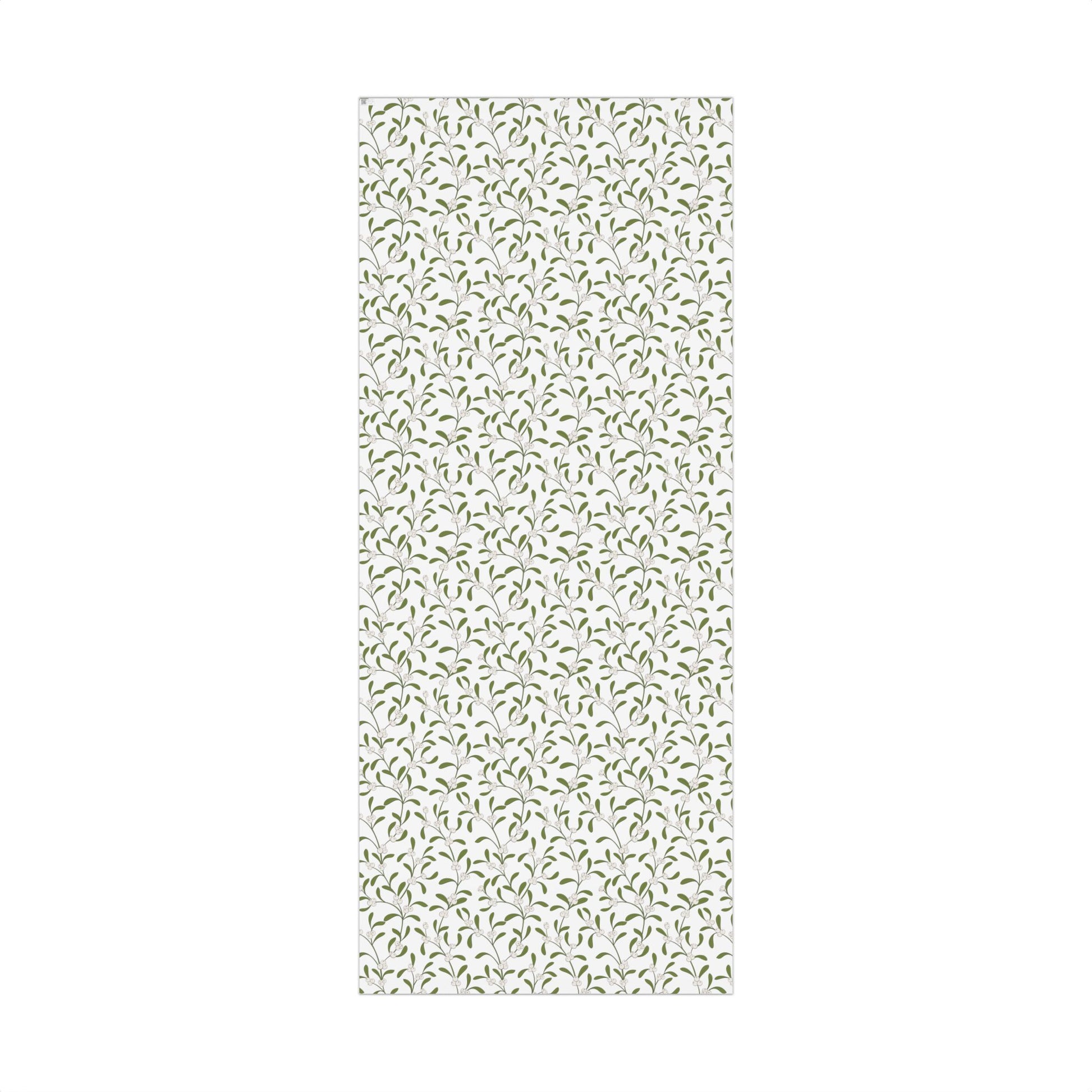 Mistletoe pattern gift wrap paper, vertical flat-lay view