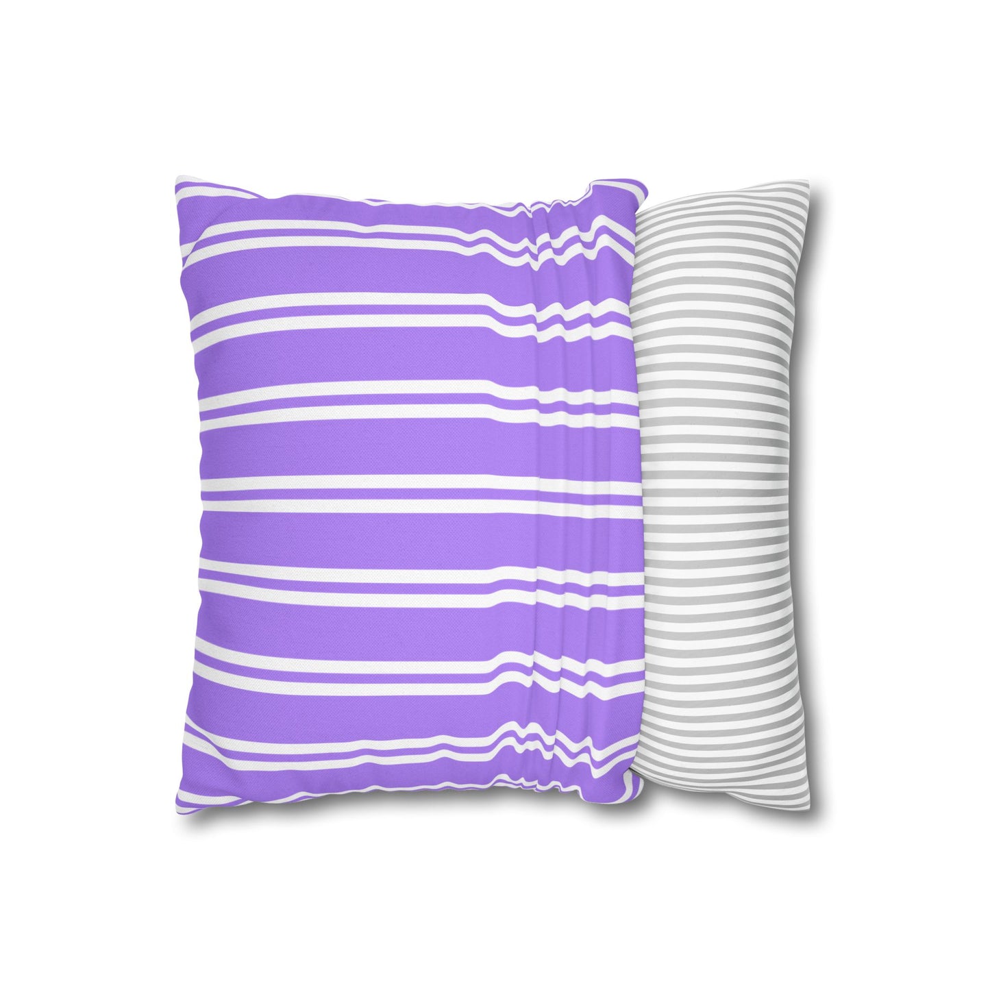 Two-sided view of the throw pillow with bunched center showing purple striped front and gray striped back to display fabric texture and dimension
