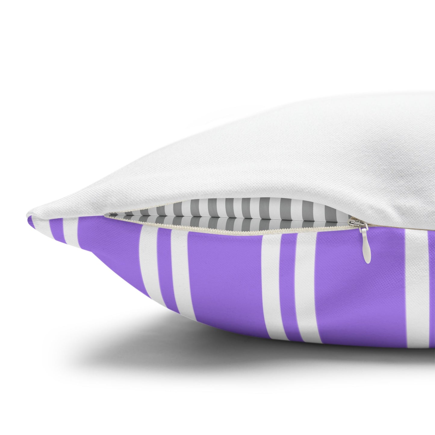 Close-up detail of the pillow opening showing the hidden zipper closure with purple and white striped front and gray striped back visible